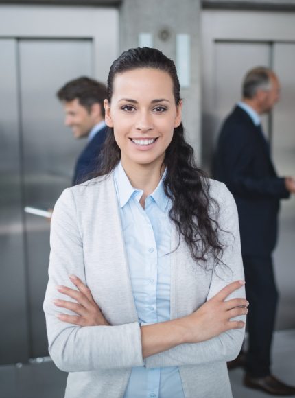 Portrait of a confident businesswoman smiling in office